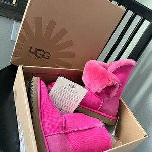 UGG Bailey button in Vibrant Pink. Boots